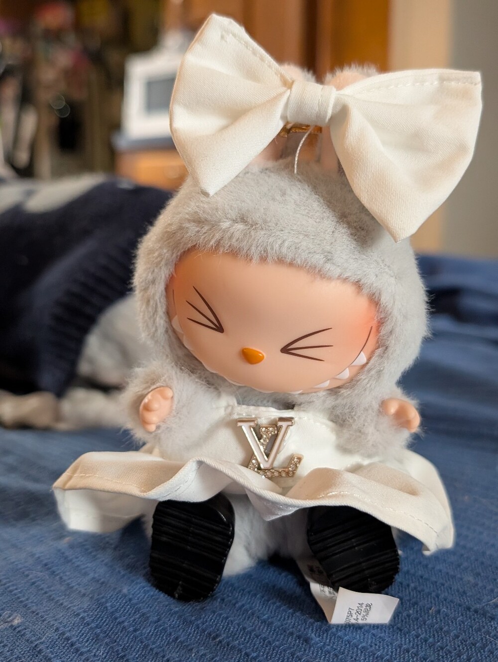 Cute Plush Doll with White Bow and Gray Fuzzy Outfit